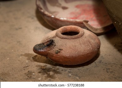The clay oil lamp, pottery oil lamp, biblical oil lamp, replica of ancient oil lamp in Nazareth Village, Israel