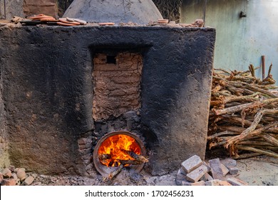 Clay Oven. Firing Of Wood Fire Kiln Is Part Of Process For Black Pottery. 