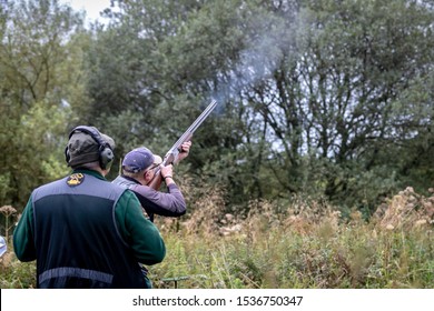 Clay Pigeon Shooting With Shotgun