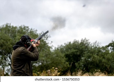 clay pigeon shooting with shotgun
