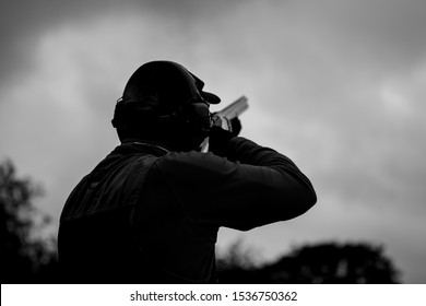 Clay Pigeon Shooting With Shotgun