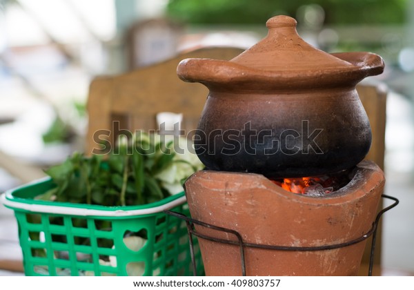 Clay Pot On Fireplace Stock Photo Edit Now 409803757