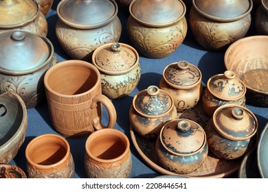 Clay Pots And Handmade Utensils For Sale At A Craft Fair. Eco-friendly Tableware