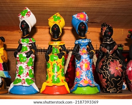 Clay Sculptures or Clay Dolls, colorful, painted with vibrant colors, from northeast Brazil, souvenirs for sale to tourists in Ceará, and used as decoration in Northeast Brazil, in Olind, Recife.