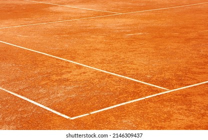 Clay tennis court. Surface outside back and side lines. Diagonal View. - Shutterstock ID 2146309437