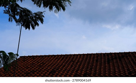 Clay Tile Rooftop Under Cloudy Sky, Residential Architecture Photography