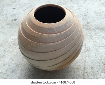 Clay Vase On Concrete Background