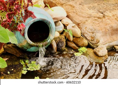 Clay Water Feature Near A Pond