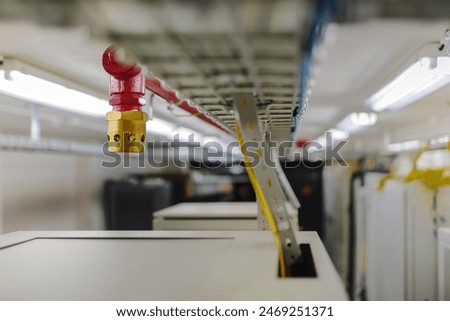 Clean agent fire suppression system used in data centers, backup battery rooms, electrical rooms (under 400 volts), sub-floors or tape storage libraries.