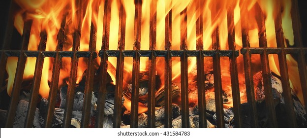 Clean Barbecue Charcoal Grill Pit With Fire Of Flame. Top View, Close-up