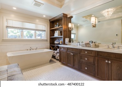 Clean Bathroom With Custom Cabinets 