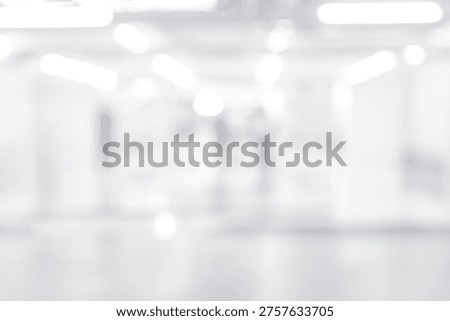 Clean blurred white interior background with soft light bokeh. Ideal for business, presentation, and modern design with copy space.