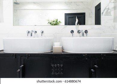 Clean bright stylish designer modern bathroom