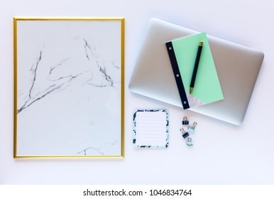 Clean, Bright Work or Study Space with Blank Message Board, Laptop Computer, and Notebook