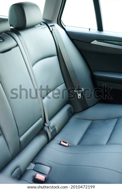 Clean\
comfortable leather back car seat close up\
view