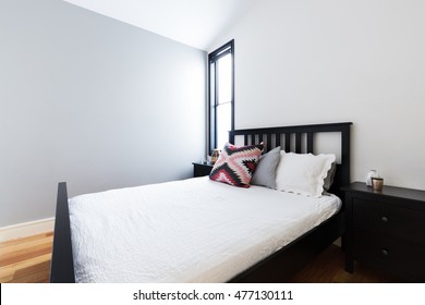 Clean Crisp Modern Bedroom With Painted Light Grey Feature Wall