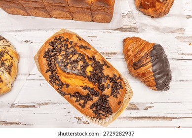 a clean cut through a chocolate sponge reveals a moist, dark crumb filled with fine air bubbles, promising a smooth mouthfeel and unparalleled cocoa intensity.