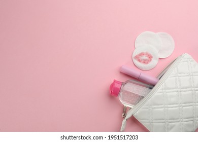 Clean And Dirty Cotton Pads, Cleansing Water With Mascara In Bag On Light Pink Background, Flat Lay. Space For Text