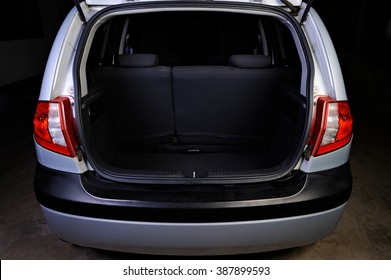 Clean Empty Trunk Of Silver Hatchback Isolated On Black