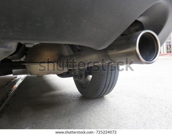 Clean exhaust pipe (Muffler and tailpipe on a\
car), used to guide reaction exhaust gases away from a controlled\
combustion inside an engine, the entire system conveys burnt gases\
from the engine