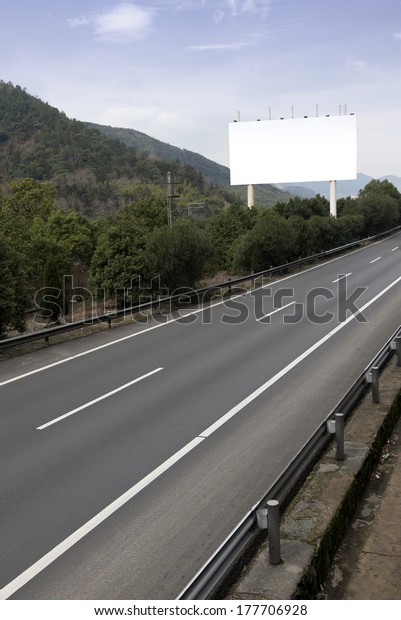 In the clean highways\
and billboards