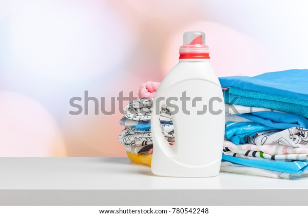 Clean
laundry and liquid washing detergent front
view