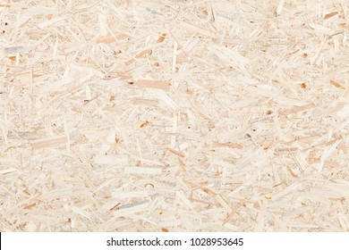 Clean, Light Surface Of Wood Particle Board. Texture Of Compressed Wood Chippings Board