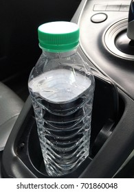 Clean Mineral Water Bottle In The Car Dashboard Cup Holder