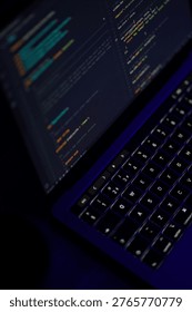 A clean and modern developer workspace featuring a laptop with coding screen in dark mode. Ideal for concepts like web development, programming, freelancing, and remote work.