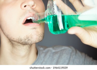 Clean Mouth With Fluid Mouthwash To Prevent Bad Smell And Get Fresh Breath As Part Of Medical Health Care