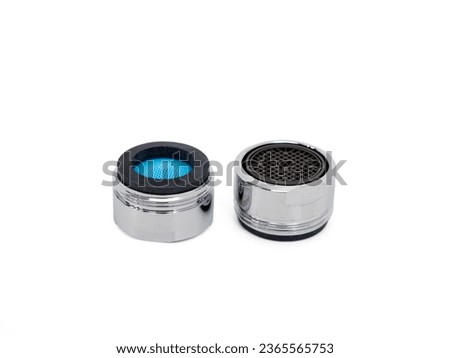 Clean new faucet aerator isolated on white background. Water tap dial for more efficient use of water or water flow regulator.