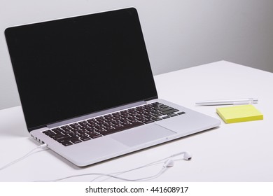 Clean Office Desk With A Laptop.