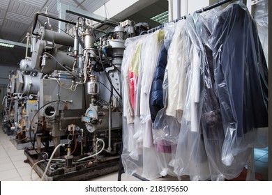 Clean Packed Clothes Hanging In Dry Cleaning