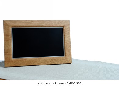 Clean Photoframe On The Table In White Background