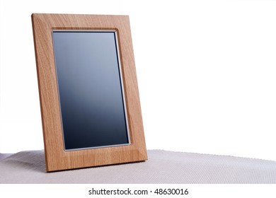 Clean Photoframe On The Table In White Background