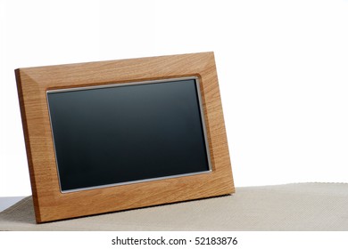 Clean Photoframe On The Table In White Background