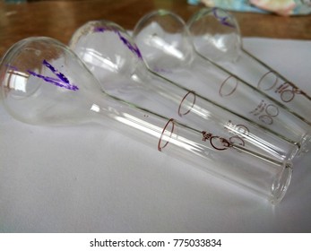 Clean pycnometers for determining the density of liquid substances.