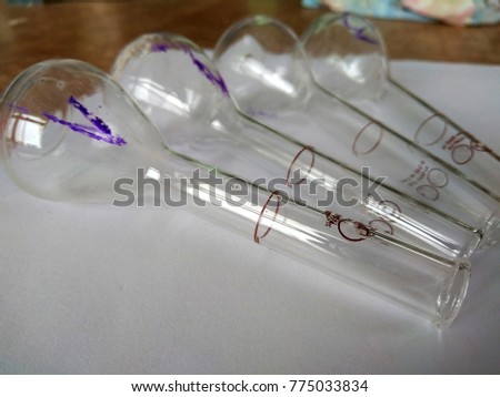 Clean pycnometers for determining the density of liquid substances.