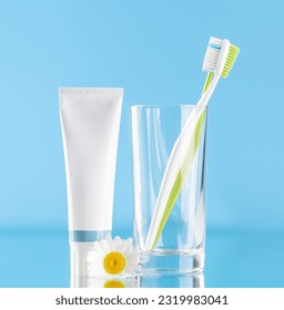 A clean and refreshing image featuring toothpaste and toothbrushes, promoting oral hygiene and a bright smile