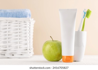 A clean and refreshing image featuring toothpaste and toothbrushes, promoting oral hygiene and a bright smile