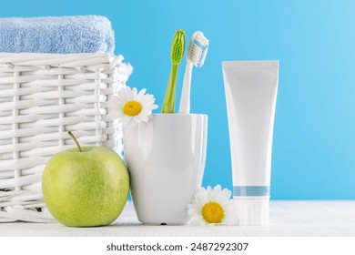 A clean and refreshing image featuring toothpaste and toothbrushes, promoting oral hygiene and a bright smile