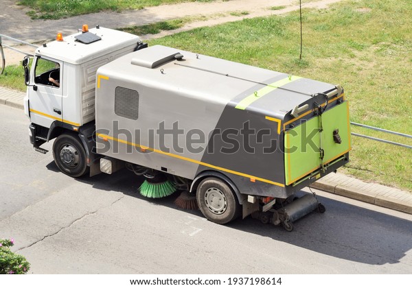 Clean roads. Street cleaning with road\
combination machine