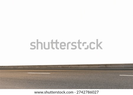 A clean section of an empty asphalt road with a concrete curb and white lane markings, isolated on a white background. This side-profile view of a highway surface highlights realistic pavement texture