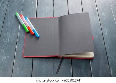 clean sheets on table with markers
