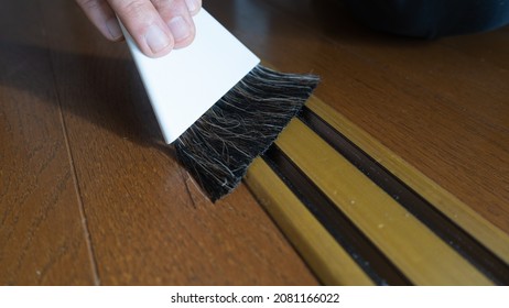 Clean The Sliding Door Rails.