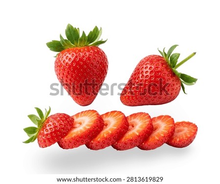 Clean studio shot of vibrant, ripe strawberries arranged with delicious fruit slices over a pure white surface.