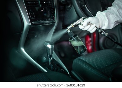 Clean surfaces in car with a disinfectant spray. Help kill coronavirus in  car after going out. - Shutterstock ID 1683131623