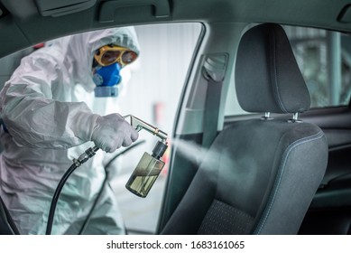 Clean surfaces in car with a disinfectant spray. Help kill coronavirus in  car after going out. - Shutterstock ID 1683161065