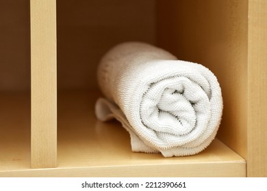 Clean Towels In A Bathroom Cabinet