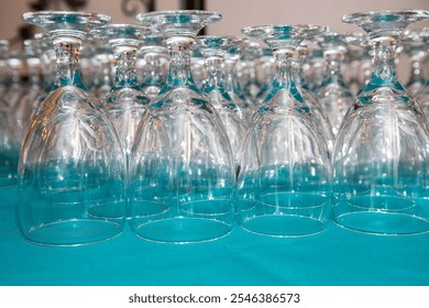 Clean Upside-Down Glasses Ready for Self-Service at a Catering or Dining Station - Powered by Shutterstock